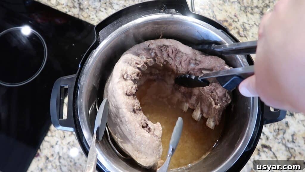 Removing finished ribs with tongs