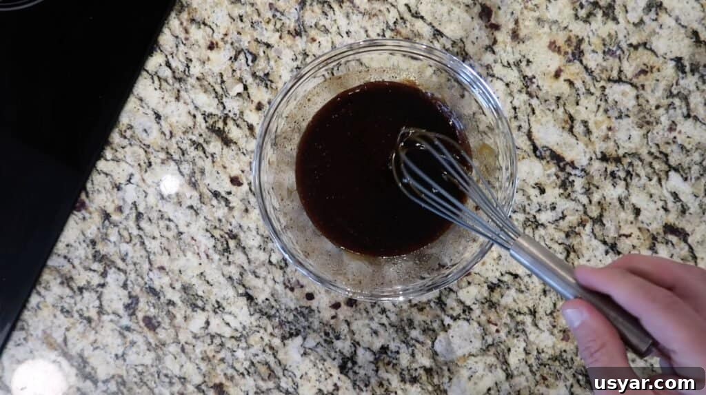 Whisking ingredients into sauce