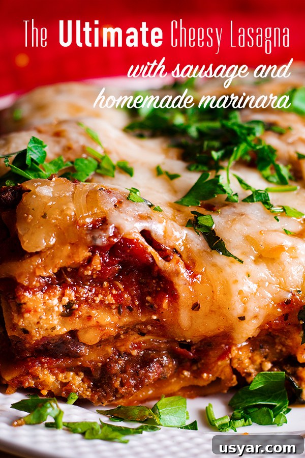 Cheesy Sausage Lasagna Recipe with Homemade Marinara 2 A piece of classic lasagna with homemade marinara and sausage on a plate.