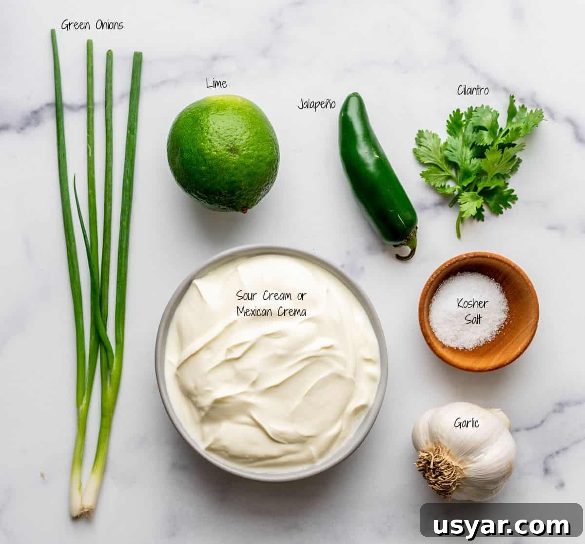Pulled Pork Salad Recipe with Smoky BBQ Vinaigrette 3 Jalapeno Ranch Dressing Ingredients on a white marble board.