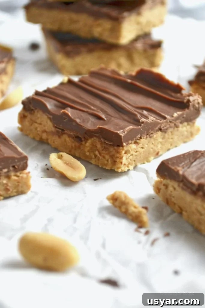 3-Ingredient Treats: Quick No-Fuss Recipes 4 close up of peanut butter bars sitting on parchment paper