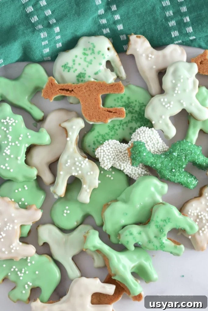 3-Ingredient Treats: Quick No-Fuss Recipes 7 animal crackers glazed with green and white frosting and sprinkles