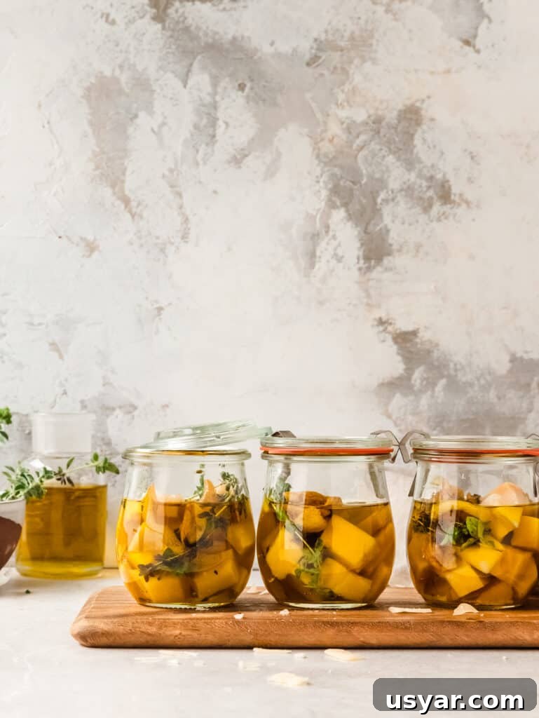 Mini Marinated Gouda Cheese Jars for Appetizers 2 Mini marinated Gouda jars served as an easy summer appetizer