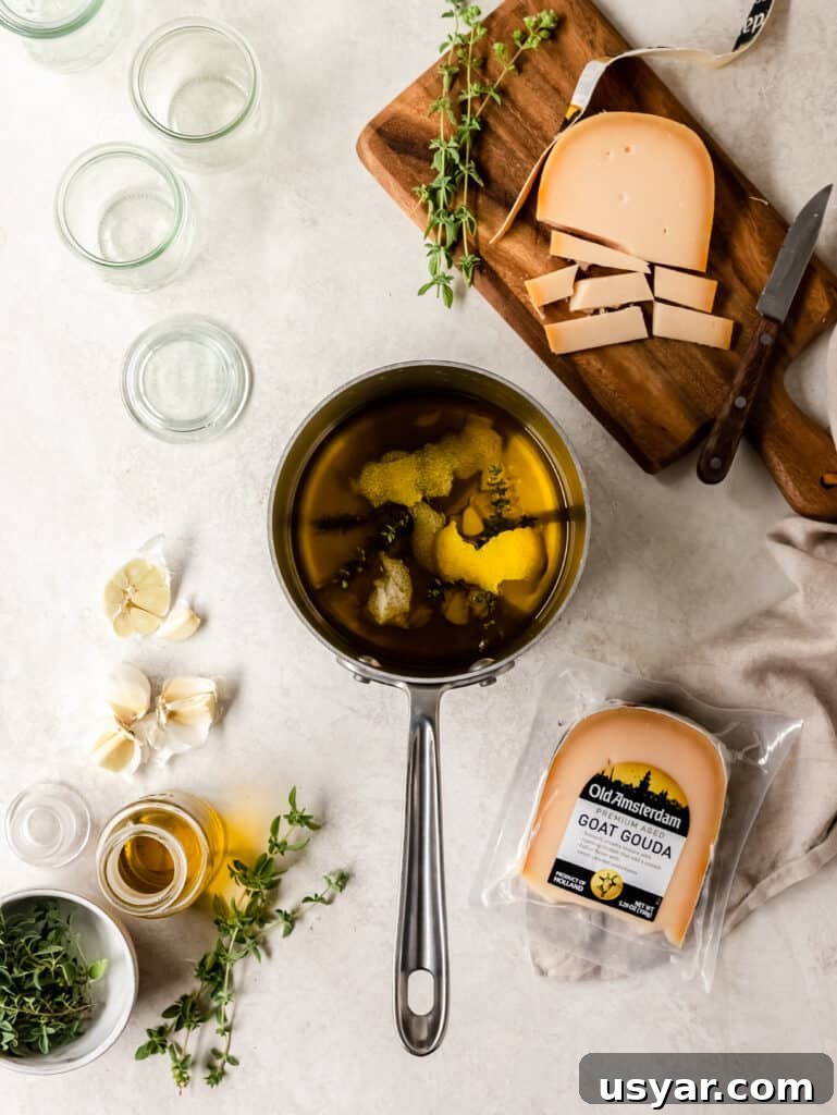 Mini Marinated Gouda Cheese Jars for Appetizers 3 Ingredients for marinated Gouda with herbs, lemon peel, and olive oil