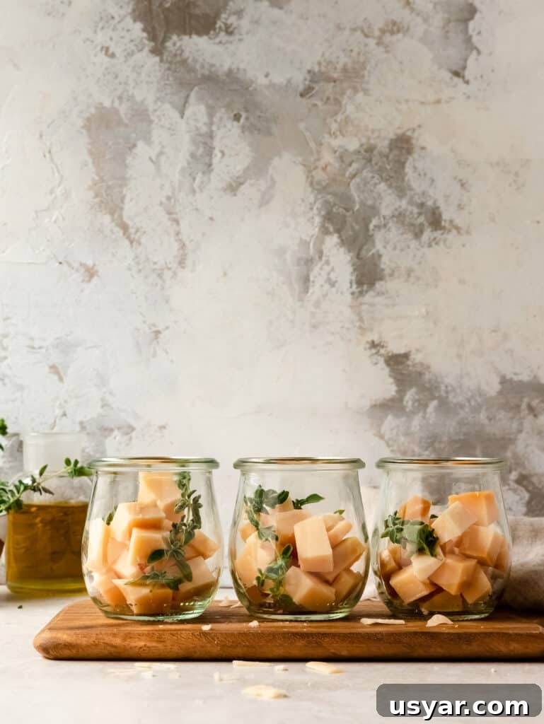 Mini Marinated Gouda Cheese Jars for Appetizers 5 Mini marinated Gouda jars arranged for serving
