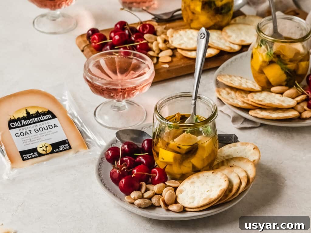 Mini Marinated Gouda Cheese Jars for Appetizers 7 Marinated Gouda served with fruit, nuts, and crackers