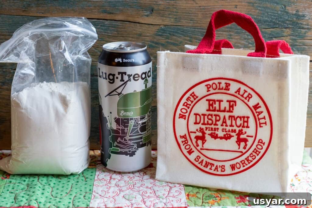 Crusty Herbed Beer Bread Recipe with Garlic and Thyme 8 Herbed Beer Bread Mix in a bag with a can of beer and a gift bag, suggesting a gift idea.