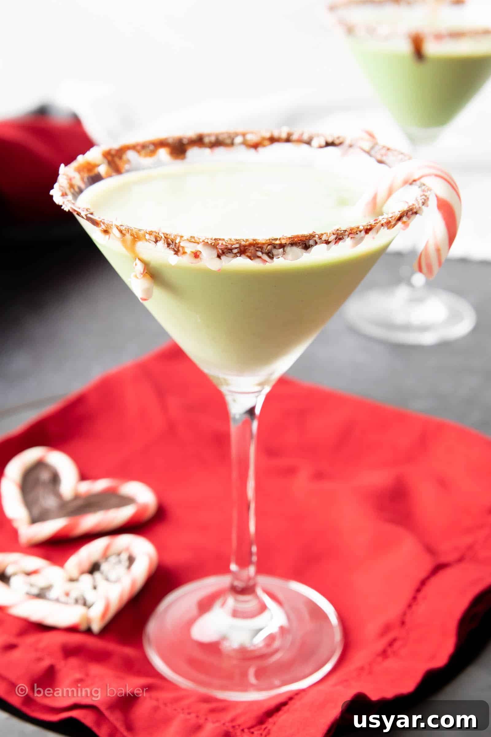 Chocolate Peppermint Martini Recipe 2 Closeup Framed chocolate peppermint martini with a mini candy cane