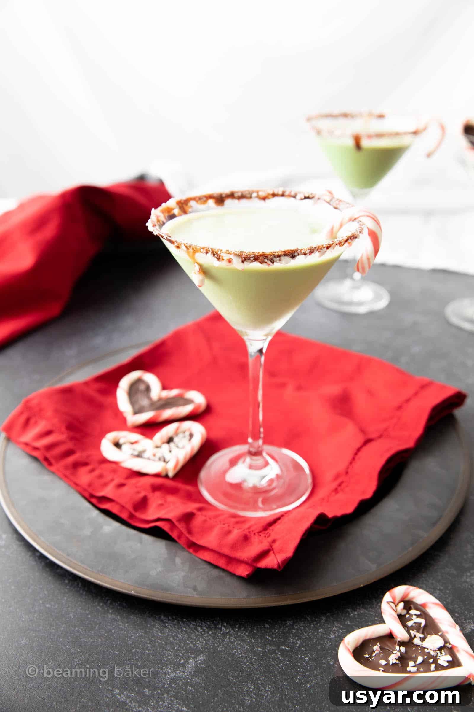 Chocolate Peppermint Martini Recipe 5 Very far away shot of chocolate mint martini with chocolate rim and crushed candy garnish