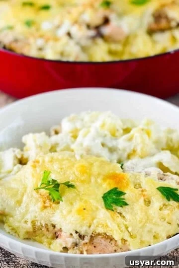 Olive Garden asiago chicken tortelloni in a white serving bowl.