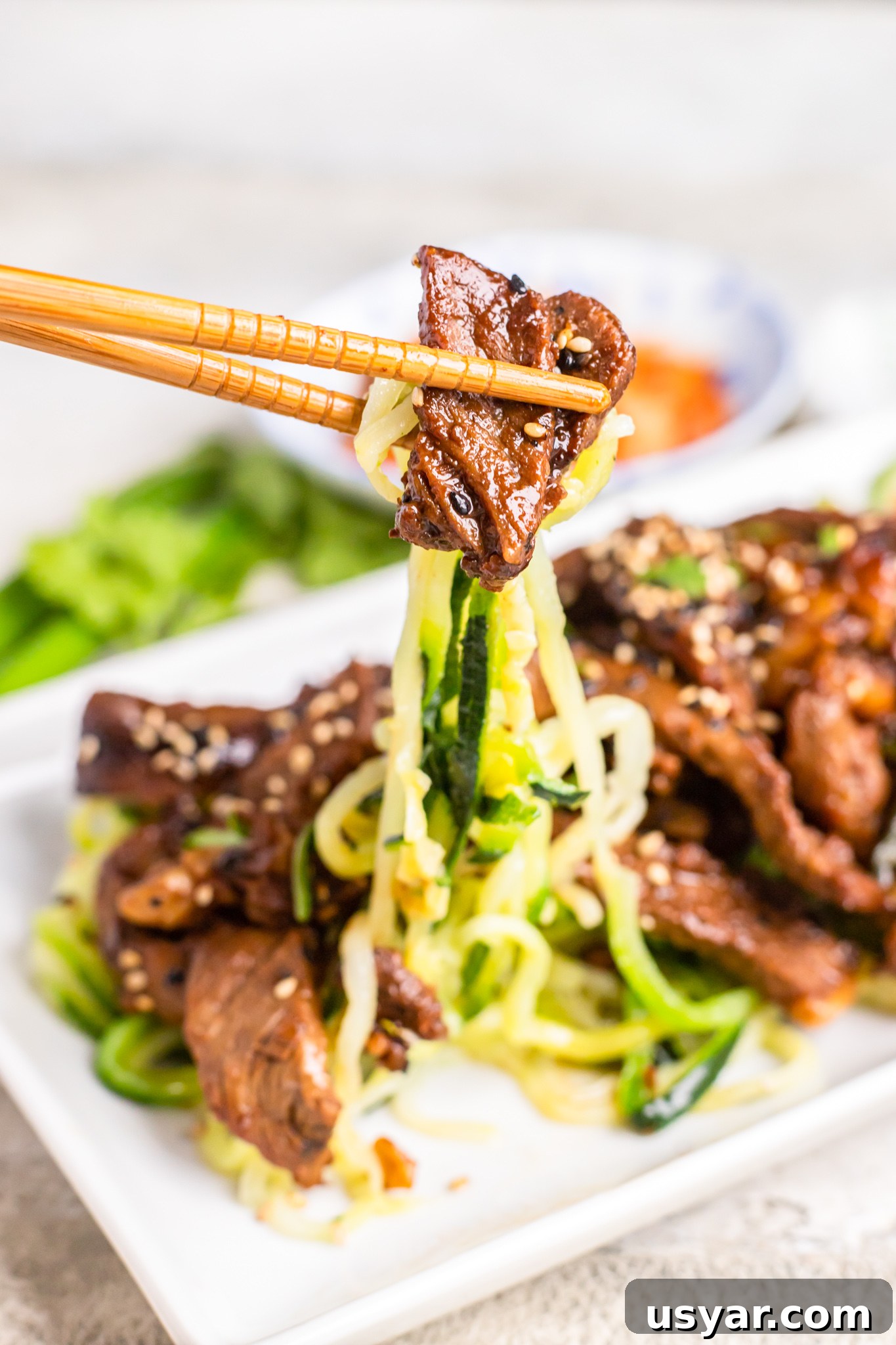 Korean Beef Bulgogi with Zucchini Noodles 3 Beef Bulgogi with Zucchini Noodles with chopsticks.