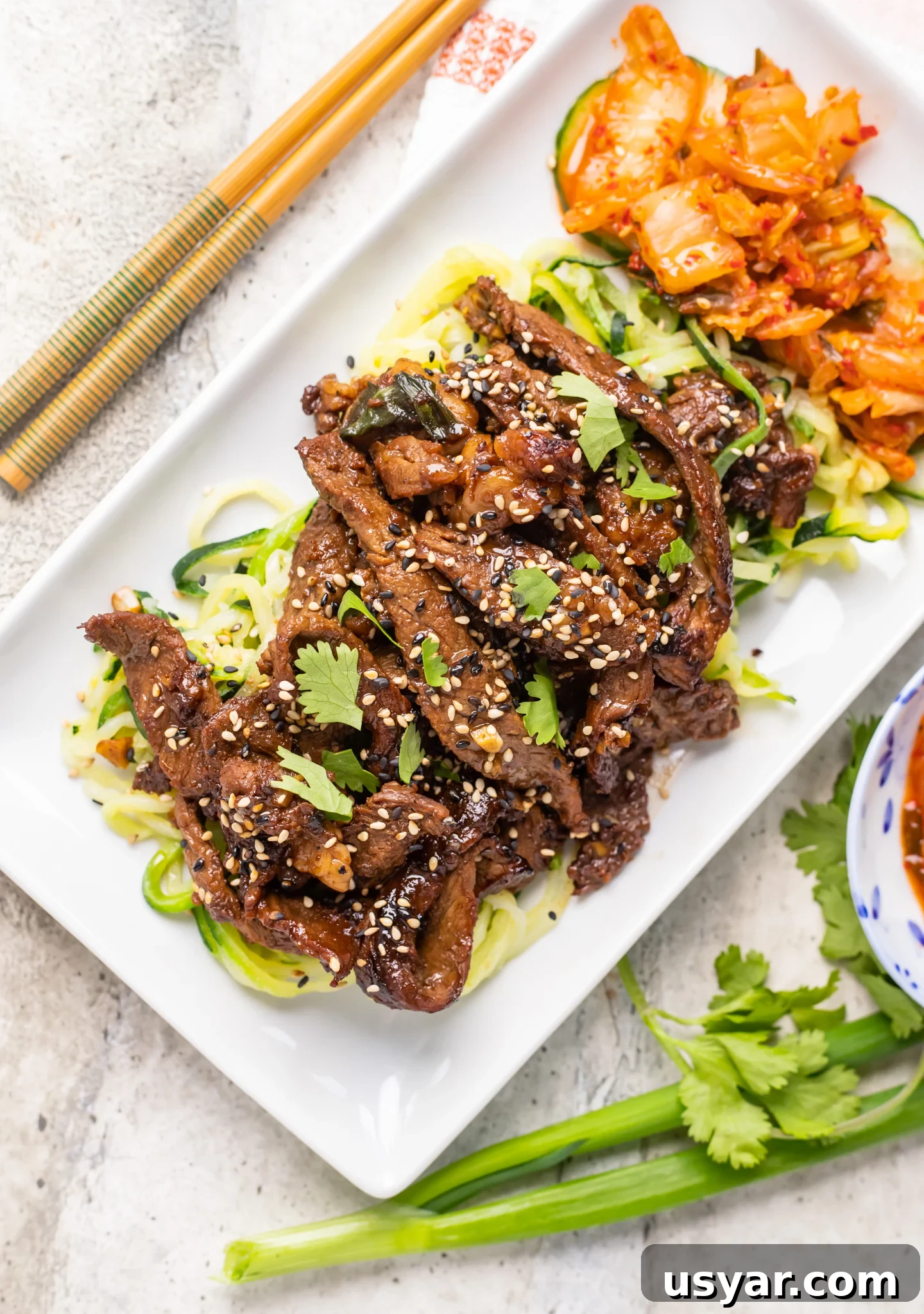 Korean Beef Bulgogi with Zucchini Noodles 6 Beef Bulgogi with Zucchini Noodles with kimchi.