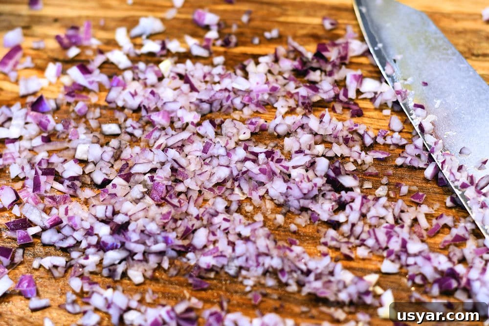 Crab Stuffed Mushrooms for Air Fryer or Oven 4 finely chopped red onion on cutting board