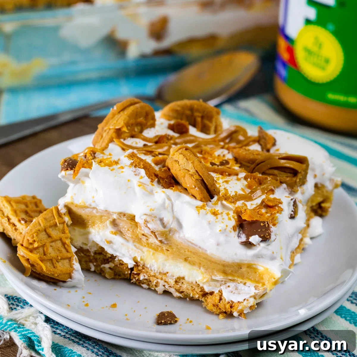 Peanut Butter Lasagna Recipe: Creamy Layered Dessert 2 Piece of Peanut Butter Lasagna on a plate.