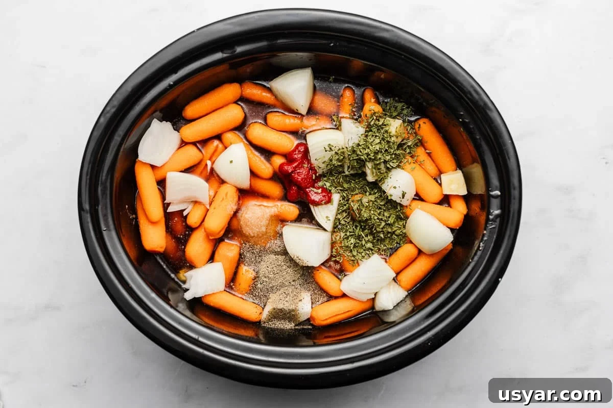 Garlic Herb Slow Cooker Pot Roast Recipe 4 Ingredients for pot roast laid out