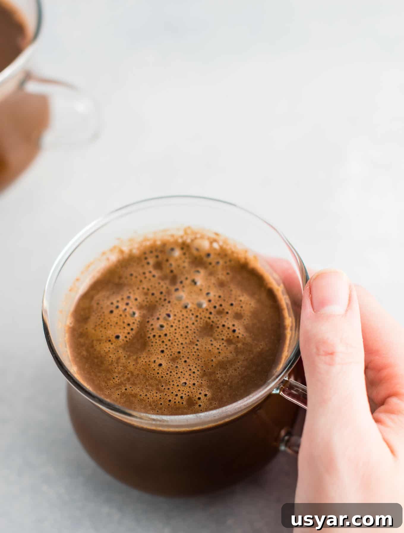 Decadent Vegan Hot Chocolate Recipe 7 Easy 4 Ingredient vegan hot chocolate recipe made with almond milk. Dairy free, gluten free, and vegan. The perfect cozy winter drink! #vegan #hotchocolate #drinks #christmas #dairyfree