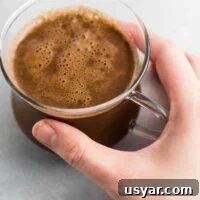 Decadent Vegan Hot Chocolate Recipe 9 Easy 4 Ingredient hot chocolate recipe made with almond milk. Dairy free, gluten free, and vegan. The perfect cozy winter drink!