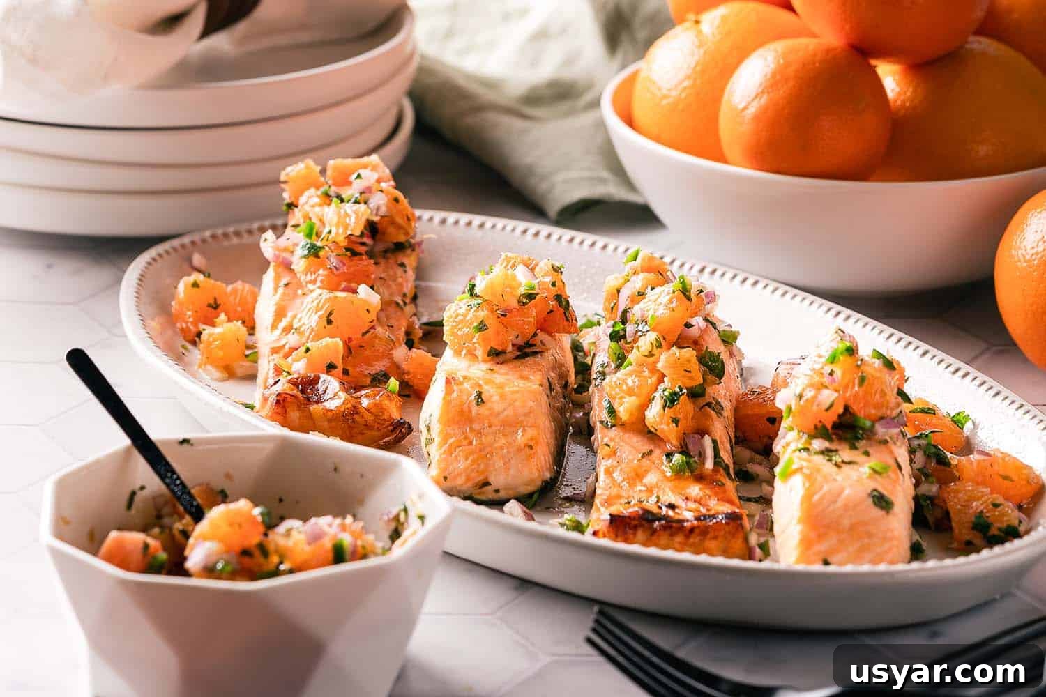 Citrus Herb Salmon with Orange and Red Onion Salsa 11 salmon with orange salsa on platter