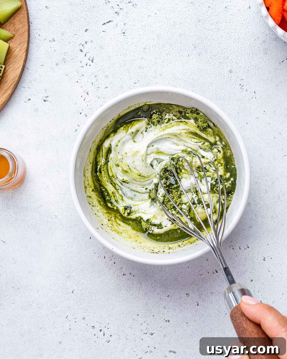 Making Matcha Yogurt.