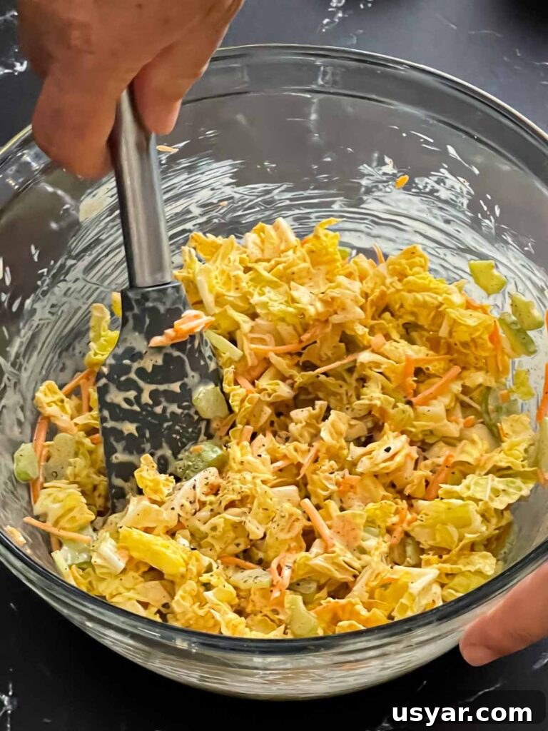 Carolina-Style Grilled Chicken Burger Recipe 12 Ancho slaw mixed in a bowl.