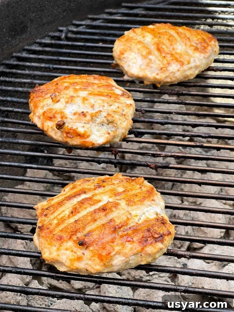 Carolina-Style Grilled Chicken Burger Recipe 18 Grilled chicken burgers on the grill.
