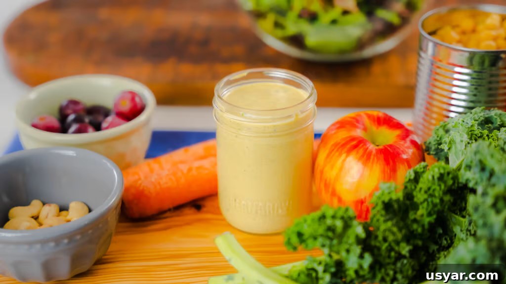 Curry yogurt salad dressing in a small bowl