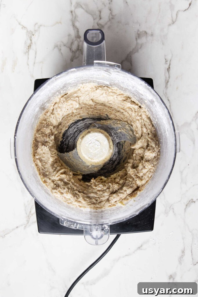 Mexican Snowball Cookies Recipe (Polvorones) 6 Pulsing the cookie dough in the food processor.