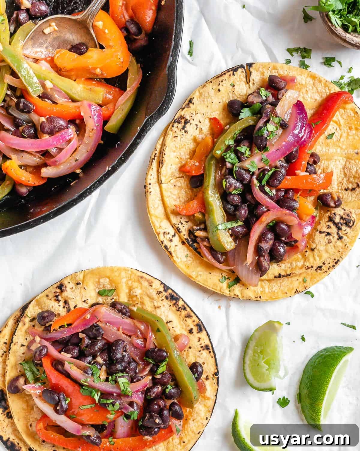 completed Vegan Fajita Tacos against a white surface