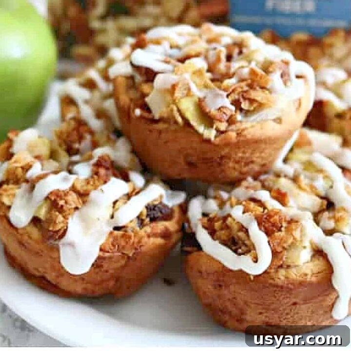 cinnamon roll apple pies on plate.