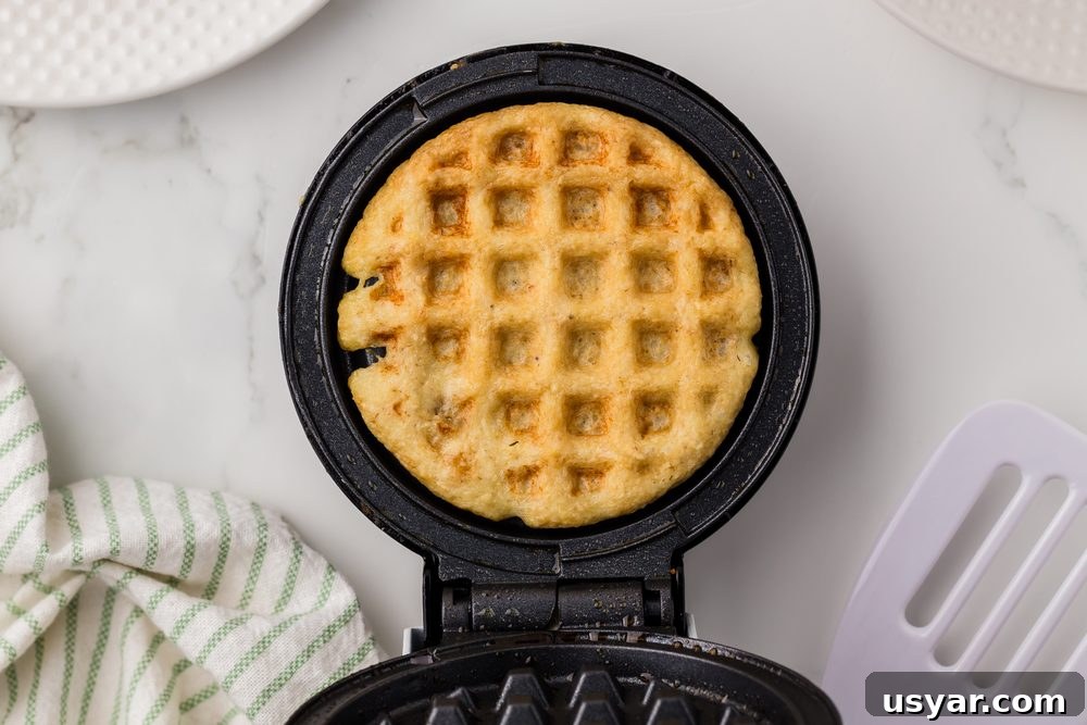 High Protein Cottage Cheese Blender Pancakes 9 Brown and crispy waffle in small waffle maker for blender pancake recipe post