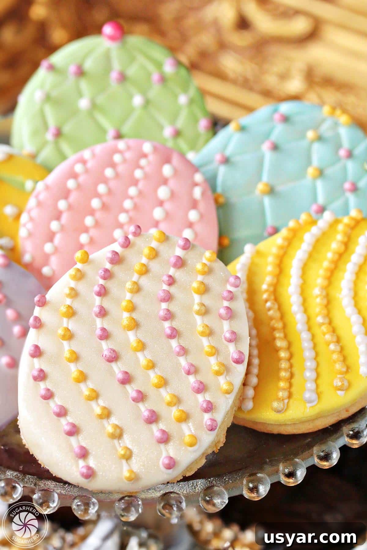 Stack of fondant-covered Easter Egg Sugar Cookies Stack of Easter egg sugar cookies with colorful sugar pearls and fondant decorations