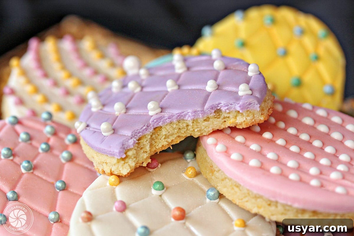 Close-up of a purple fondant Easter Egg Sugar Cookie with a bite taken out Close-up of sugar cookie with purple fondant, and a bite taken out of it