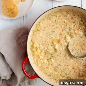 Creamy Razor Clam Chowder Recipe 8 A large dutch oven pot with a creamy clam chowder.