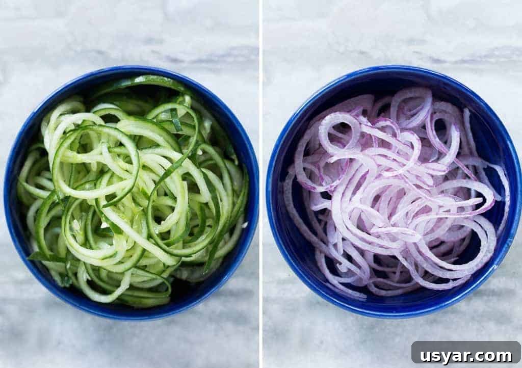 Gluten-Free Shrimp, Cucumber Noodle and Mango Salad 3 cucumbers and onions cut in the shape of a noodle