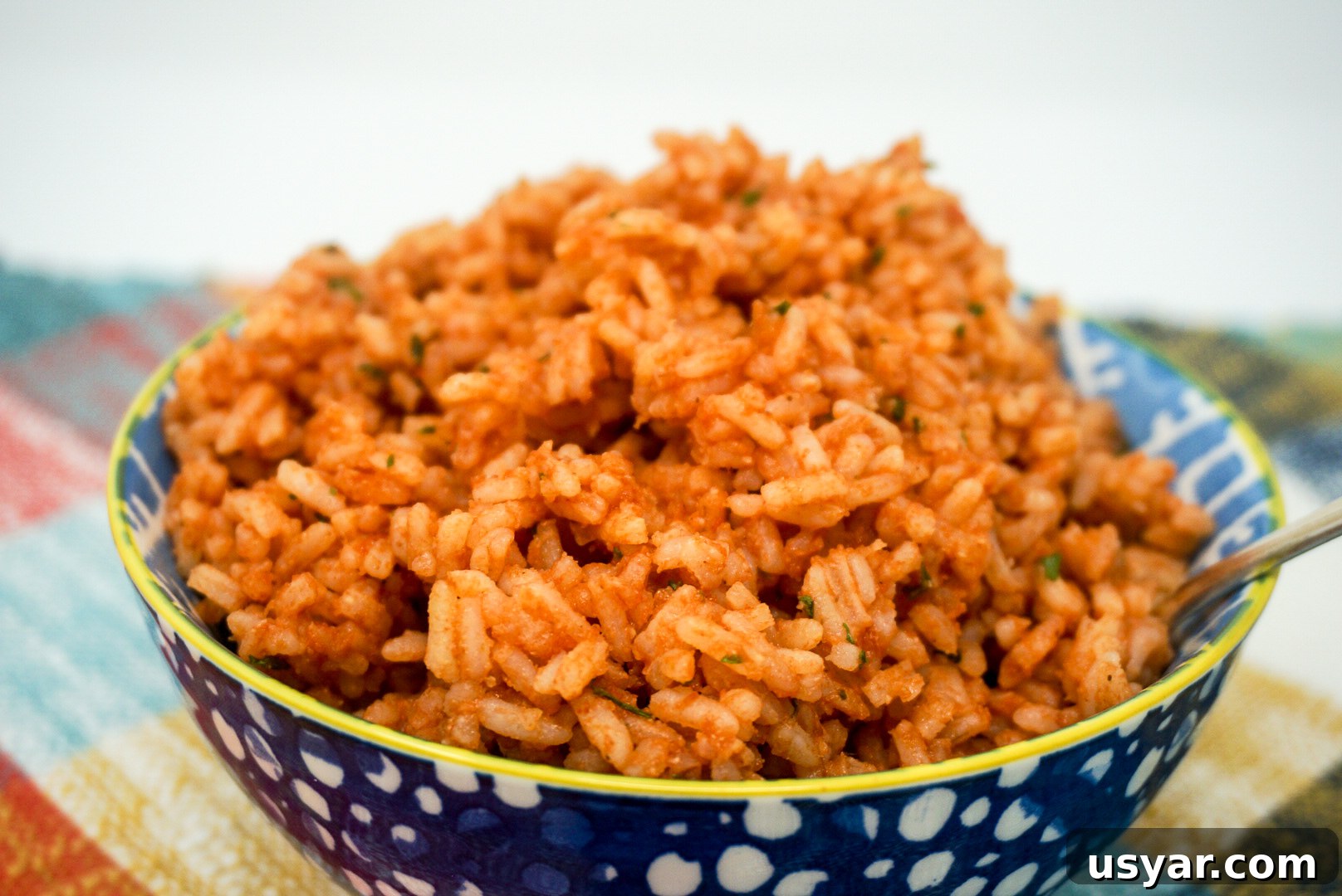 10-Minute Mexican Rice Recipe Made with Minute Rice 3 Mexican Rice with Minute Rice in a bowl ready to eat