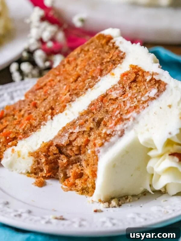 Classic Coconut Cake Recipe with Coconut Cream Frosting 10 Close-up of a slice of carrot cake
