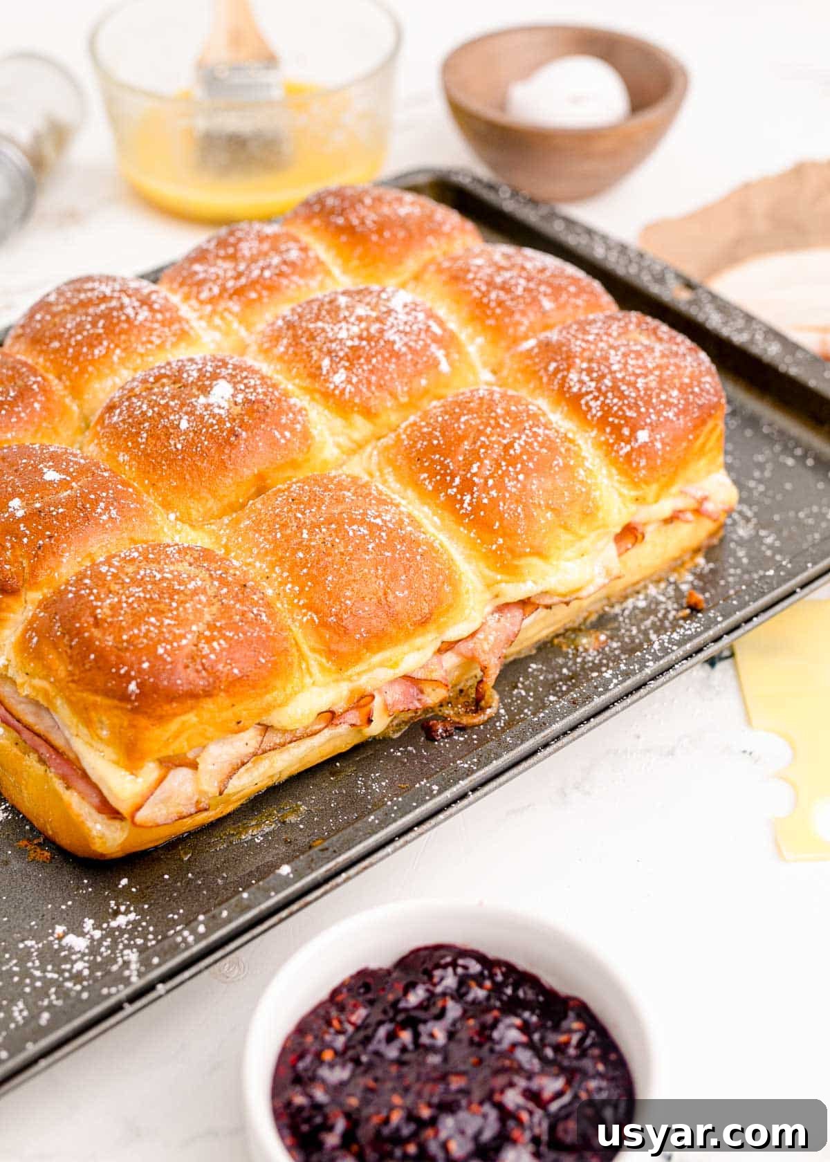 Monte cristo sliders on a pan.