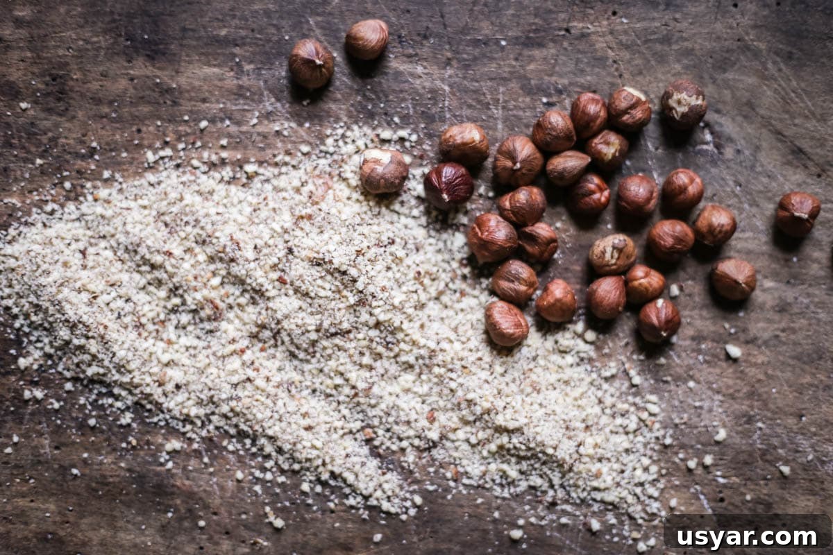 Nut Flours: Uses, Baking Tips and Substitutes 17 Overhead shot of hazelnuts and Hazelnut Flour on a wooden board