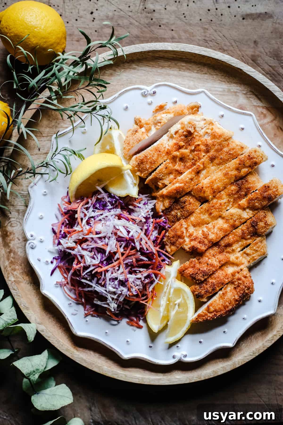 Nut Flours: Uses, Baking Tips and Substitutes 21 overhead view of Plate of Gluten-Free Chicken Schnitzel with coleslaw and lemon