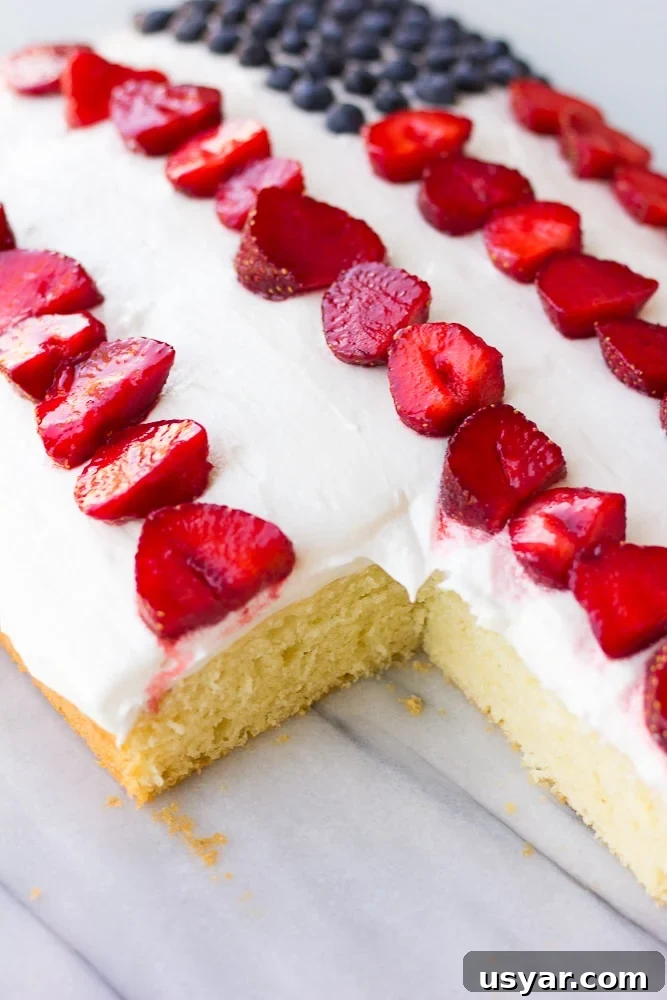 One-Bowl Vegan American Flag Cake for Fourth of July 4 vegan flag cake with a piece cut out