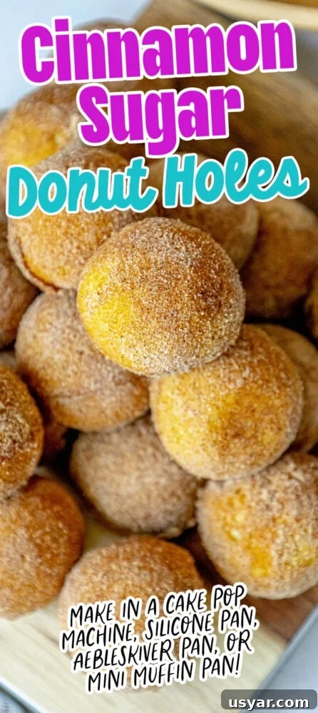 Homemade Baked Cinnamon Sugar Donut Holes Recipe 13 picture of donut holes rubbed in cinnamon sugar stacked on a cutting board