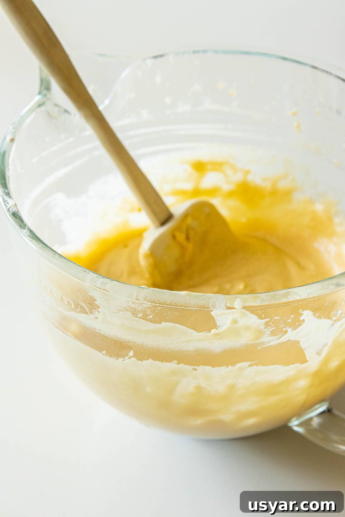 Homemade Baked Cinnamon Sugar Donut Holes Recipe 7 picture of batter in a bowl