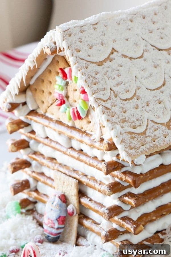 Build a Log Cabin Gingerbread House: Step-by-Step Video 5 side view of a gingerbread house