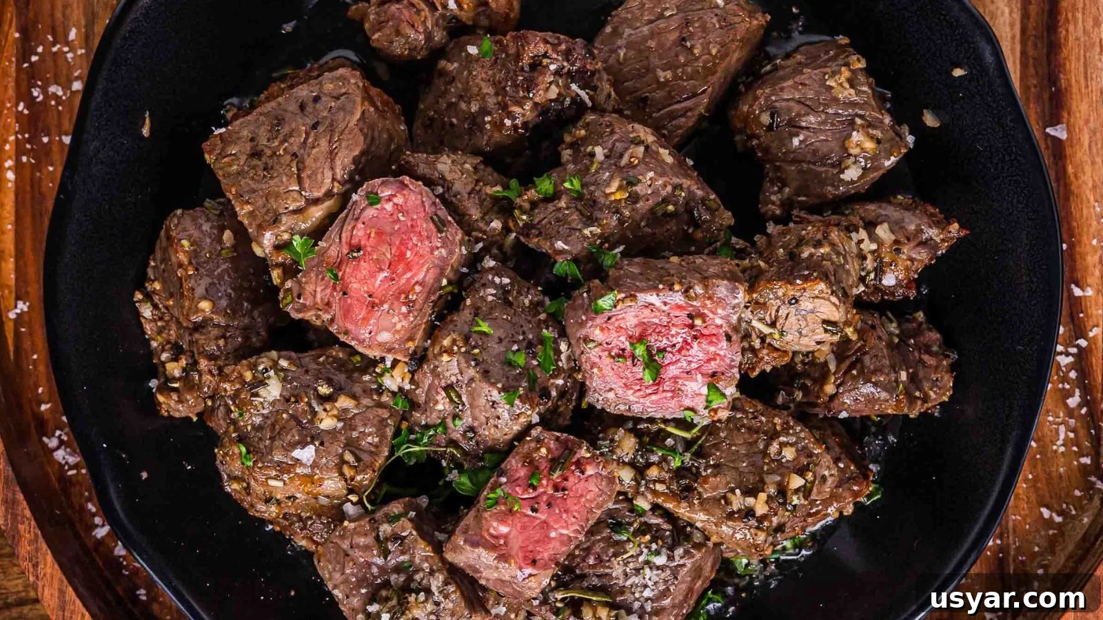17 Potluck Appetizers to Get the Party Started 17 Air fryer garlic butter steak bites with browned edges.