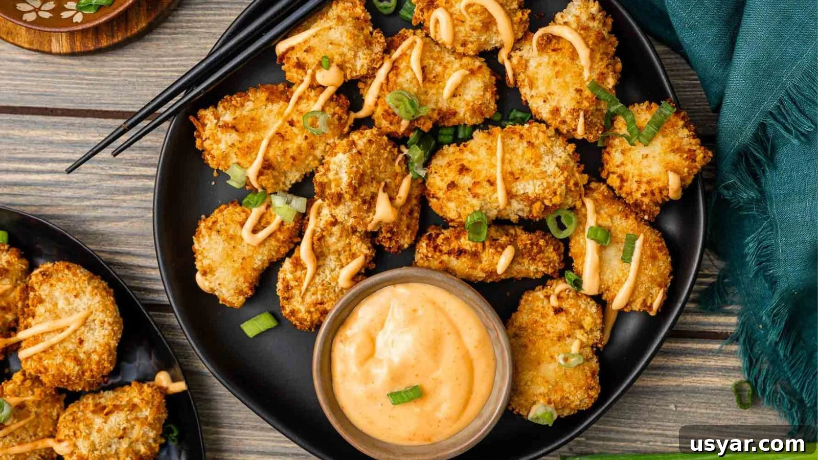 17 Potluck Appetizers to Get the Party Started 8 Air fryer bang bang chicken bites coated in sweet, spicy sauce.