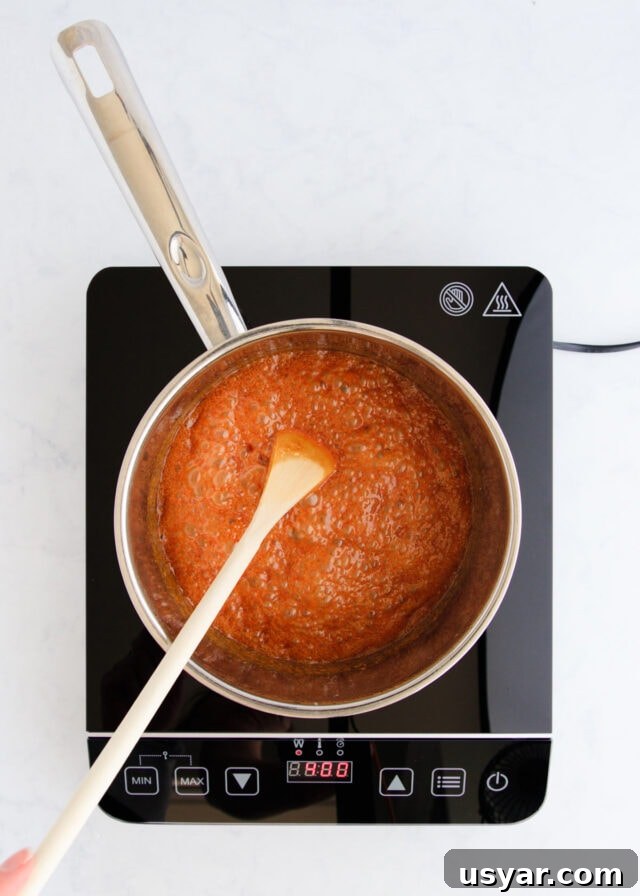 Rum Caramel Sauce Recipe 10 The caramel being cooked a little more.