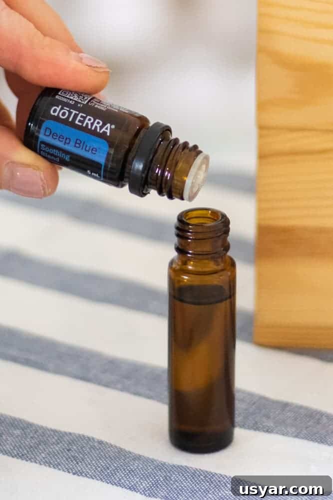 Deep Blue Essential Oil: Uses, Benefits and Application Tips 3 making a deep blue roller bottle