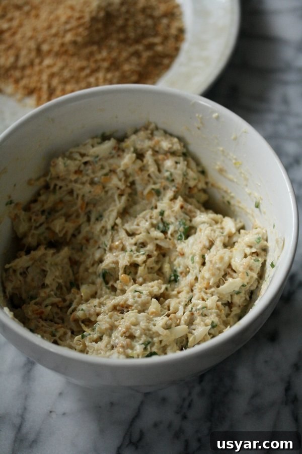 Pretzel-Crusted Gluten-Free Crab Cakes Recipe 5 raw gluten-free crab cake mixture in a bowl