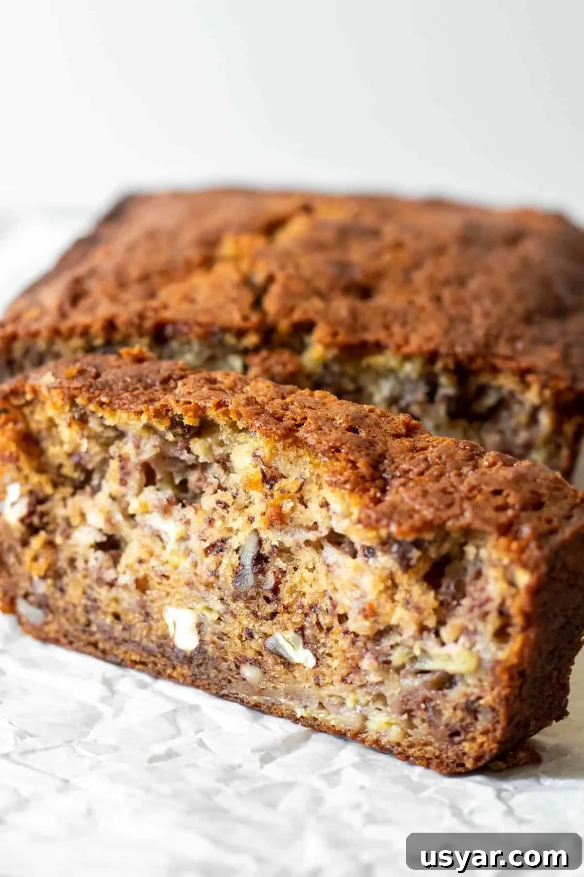 Moist Banana Bread Recipe with Ripe Bananas 3 Close up of a slice of banana bread.