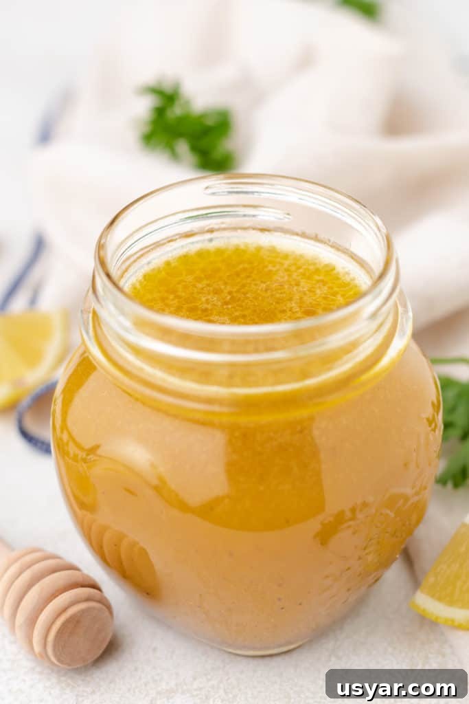 Honey Lemon Vinaigrette Salad Dressing Recipe 5 Honey lemon salad dressing in a glass jar.